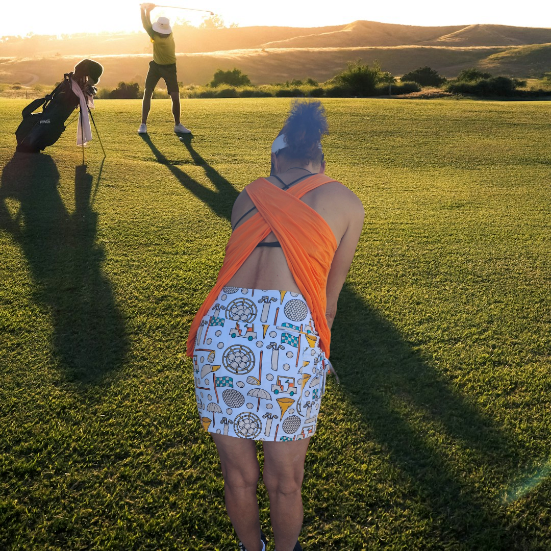 Golf Skort: Breathable Fabric, Adjustable Waistband, Built-in Shorts