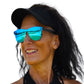 a woman wearing sunglasses and a black hat