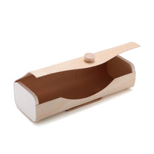 a wooden box with a wooden handle on a white background