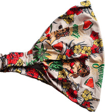 Load image into Gallery viewer, a bow tie with a hula girl hawaiian design  design on it
