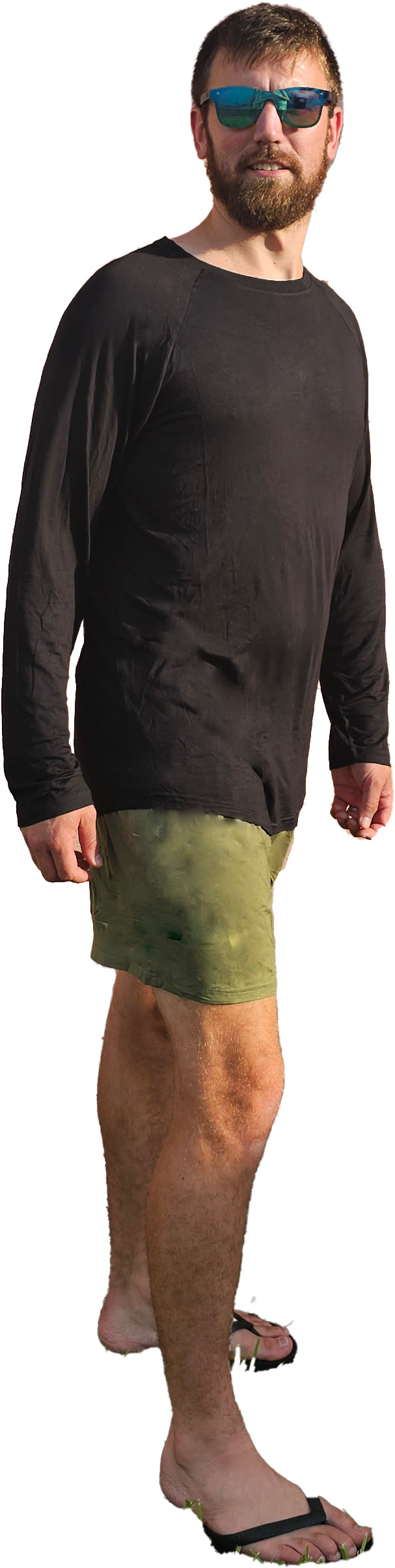 a man in a black shirt and green shorts