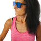 a woman with long hair and blue sunglasses