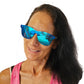a woman with long black hair wearing blue sunglasses