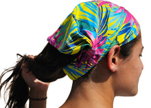 Load image into Gallery viewer, a woman with a colorful hair tie on her head

