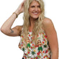 a woman with long blonde hair wearing a top wearing a hula girl hawaiian design tank top 