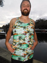 Load image into Gallery viewer, a man with a beard standing next to a body of water
