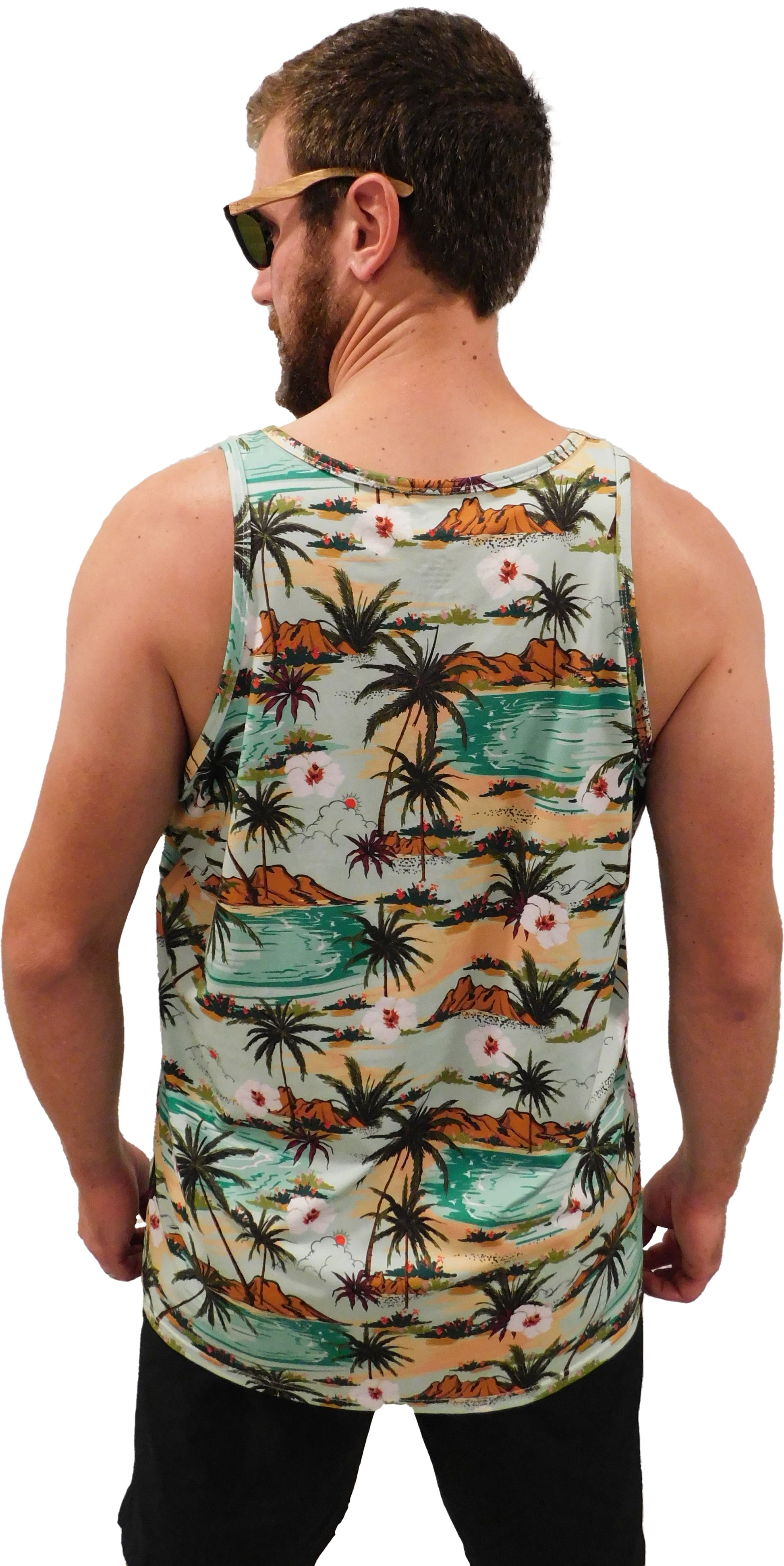 a man wearing a tank top with palm trees on it