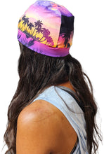 Load image into Gallery viewer, a woman wearing a Lavender island hat with palm trees on it
