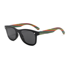 Load image into Gallery viewer, a pair of black sunglasses with a colorful striped handle
