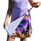 a young girl is holding a kite in her hand wearing a Lavender island wrap and matching bandana headband 