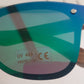 a pair of blue and green sunglasses sitting on top of a table