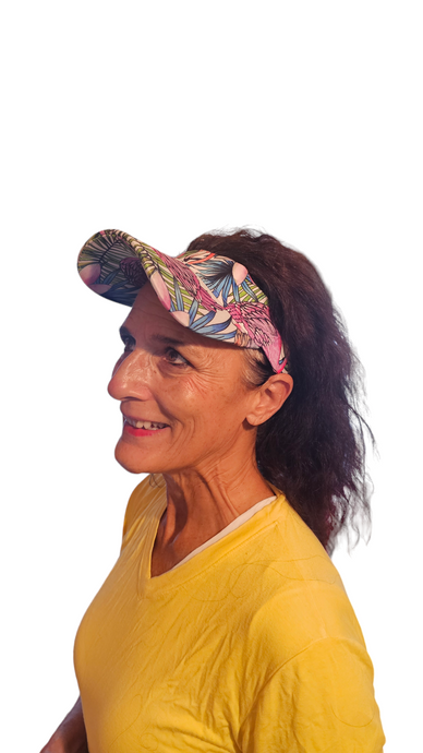 a woman wearing a yellow shirt and a hat