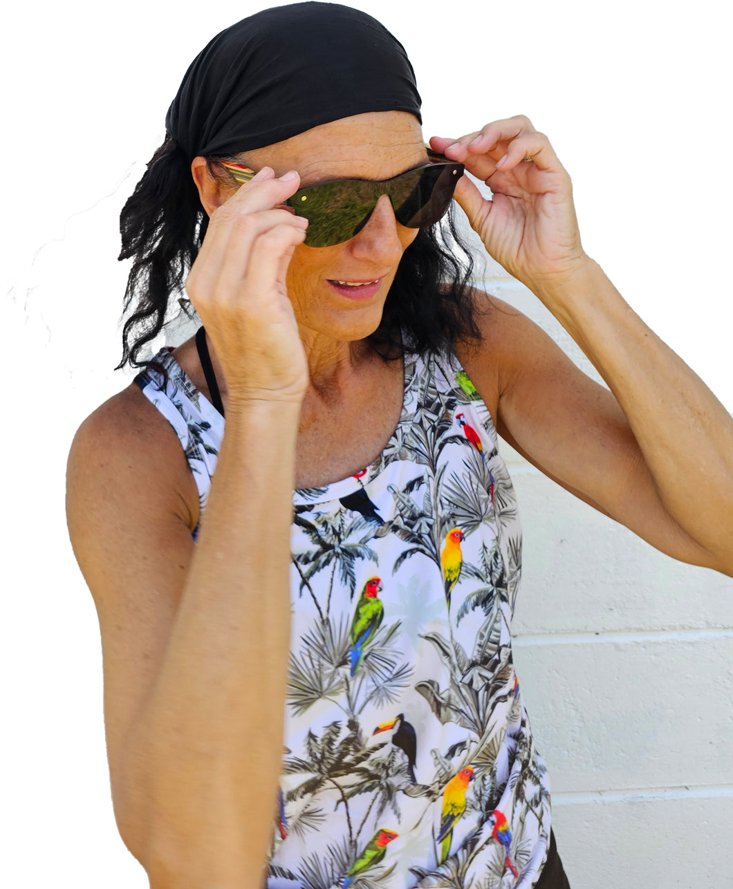 a woman wearing a black bandana and sunglasses