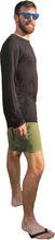 Load image into Gallery viewer, a man in a black shirt and green shorts
