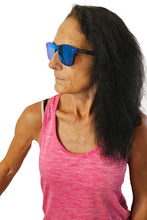 Load image into Gallery viewer, a woman with long hair and blue sunglasses
