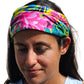 a woman with a colorful headband on her head