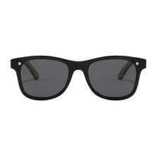 Load image into Gallery viewer, a pair of black sunglasses on a white background
