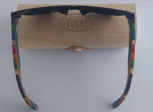 Load image into Gallery viewer, a pair of glasses with a wooden holder
